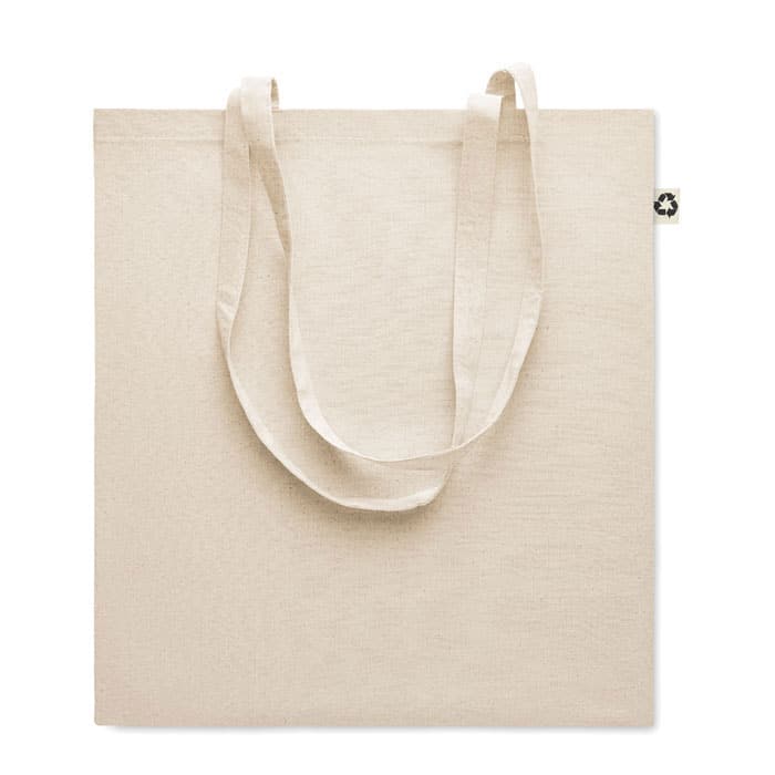 Un Tote Bag en Coton Recyclé - Naturel fabriqué à partir de coton recyclé sur fond blanc.